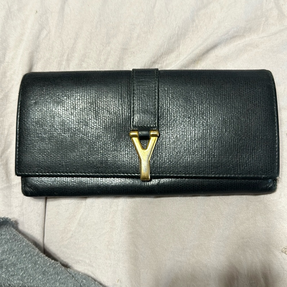 YSL wallet used the snap don’t work need to be replaced
